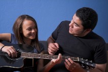 guitar instructor and student 