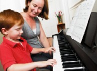 piano teacher and student